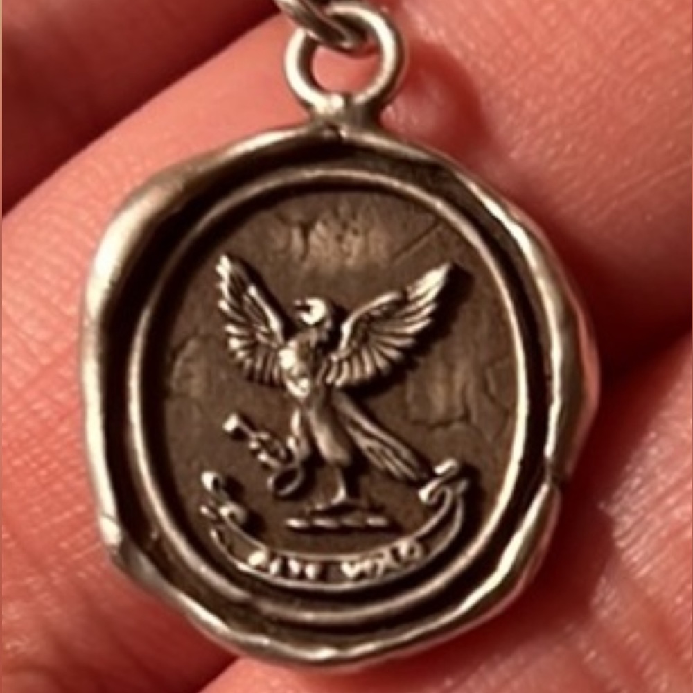 Pyrrha pendant “limitless” with 20” original chain. Used condition, silver
